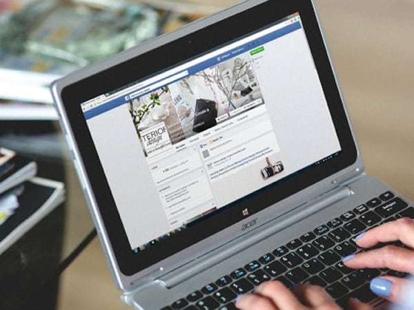 laptop displaying social media platform